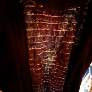 Catherines 4x blue ruffle 2fer top with black sweater attached.